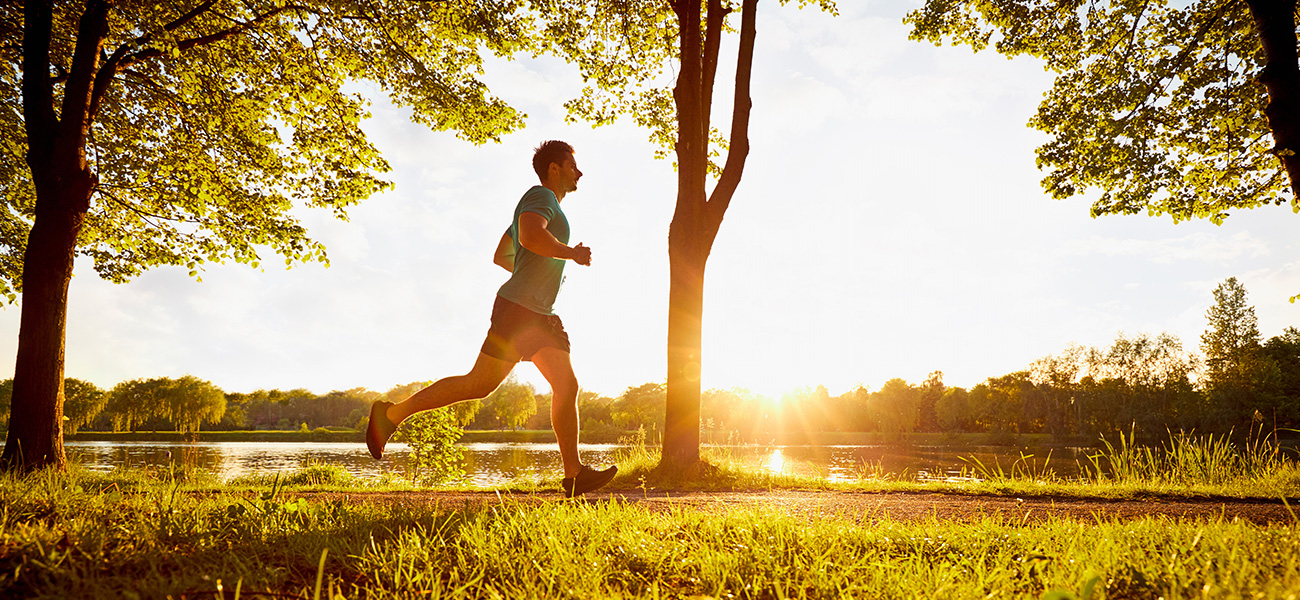 Man running at a park.