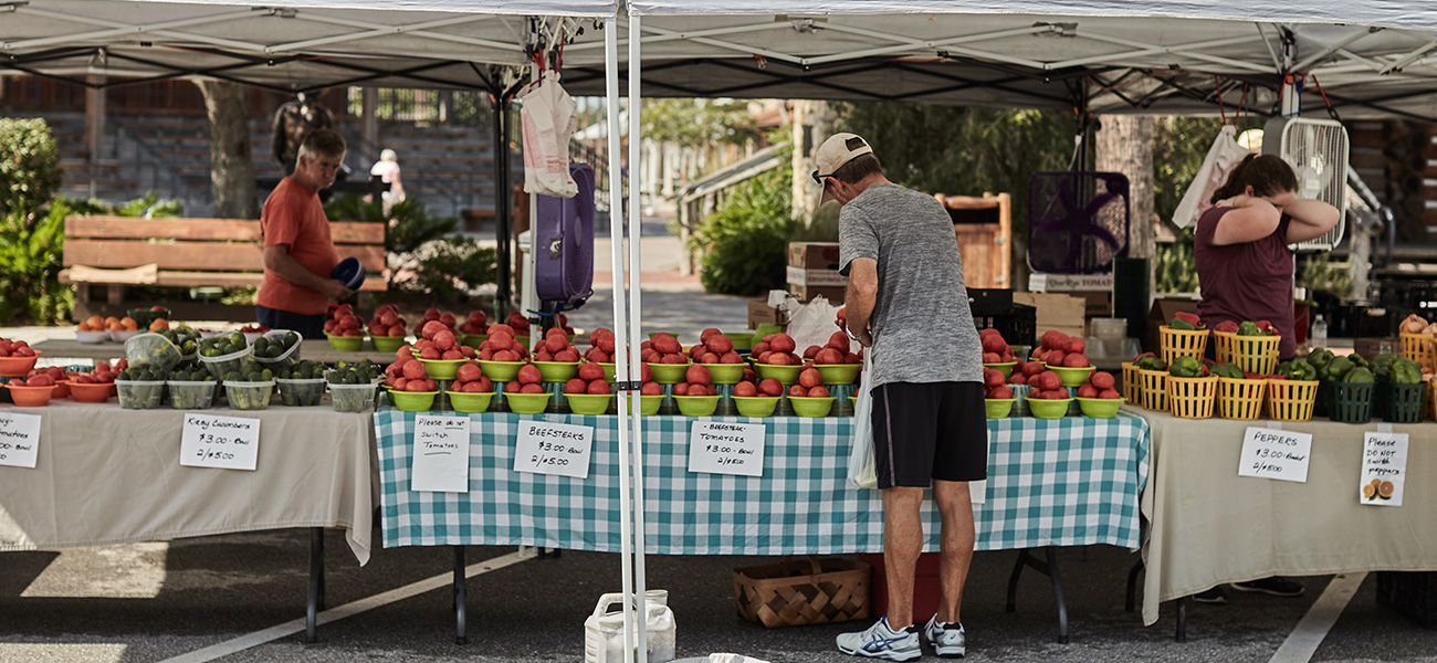 Man shopping at a market.