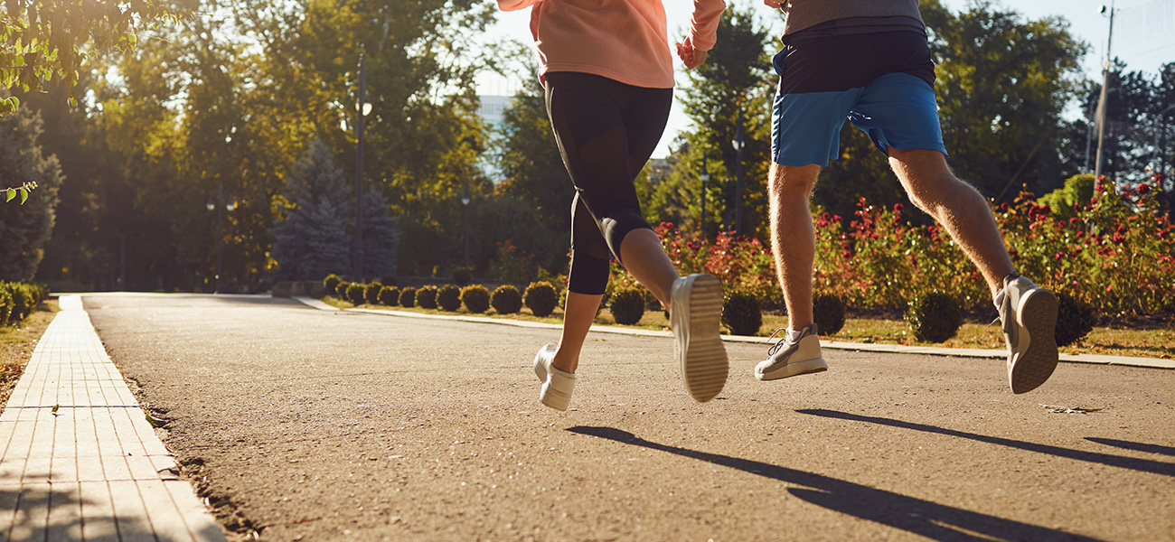 People running in the park.