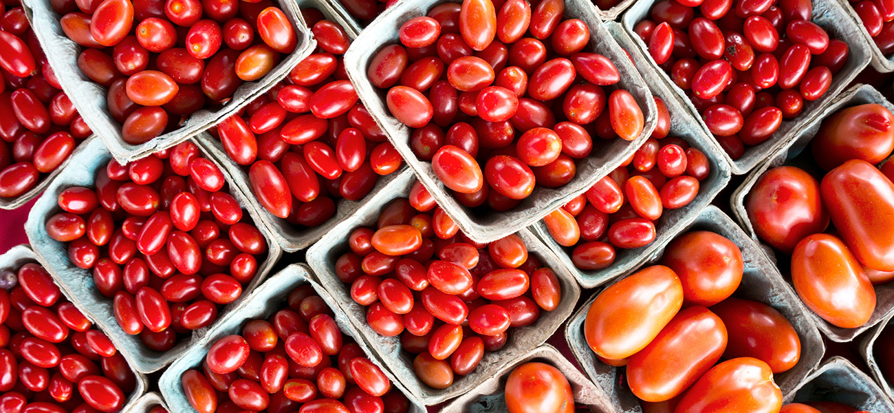 A variety of tomatoes at the market.