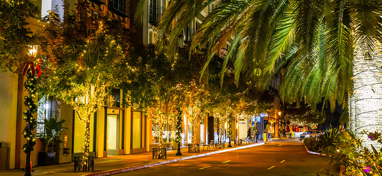 Santana Row lit up at night.